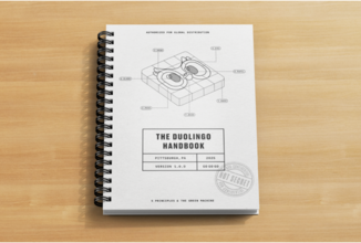 The Duolingo Handbook laying on a table
